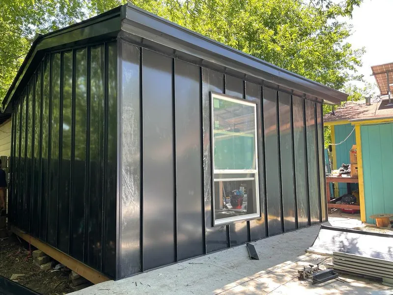 Black standing seam metal wall panels for Roof Inspection in Pittsburg